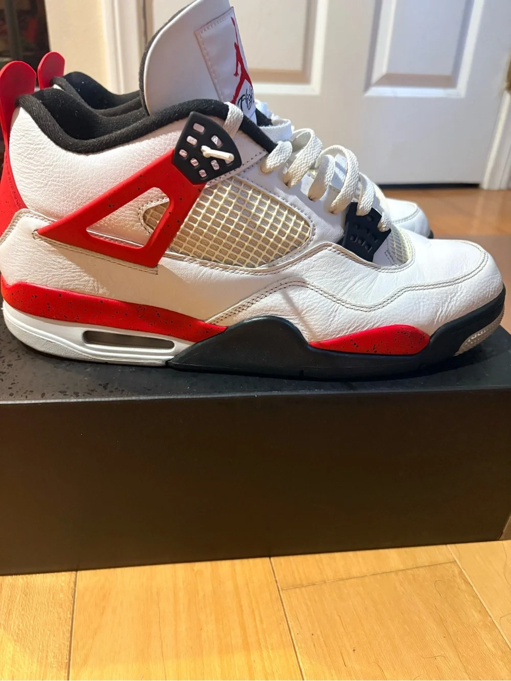 Jordan men’s White/Black/Red Retro Sneaker